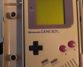 1989 Nintendo Game Boy with carrying case. and Super Mario game cartridge.
