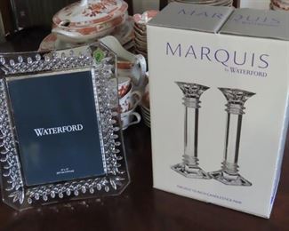 New with boxes, Waterford candle sticks and photo frame.