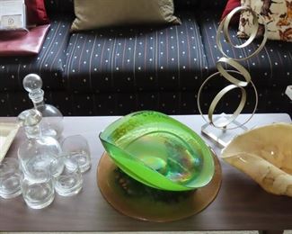 More glass and unusual sculpture, etched decanter and whiskey glasses.