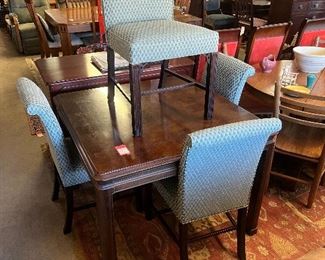 Chippendale style table and four chairs.