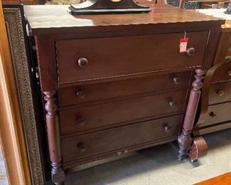 Antique American cherry chest of drawers.