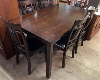 Table and six chairs.