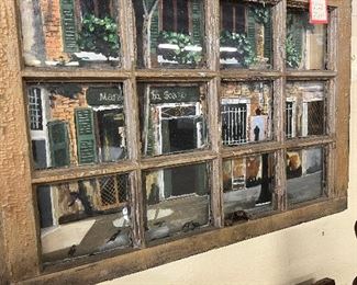 Oil painting in distressed window frame.