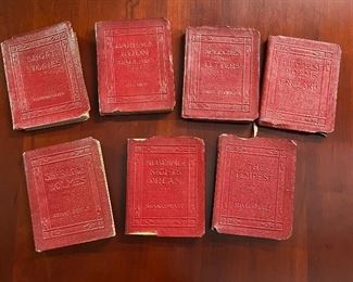 Seven volumes of the Little Leather Library.