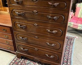 Davis Cabinet Co walnut chest of drawers.