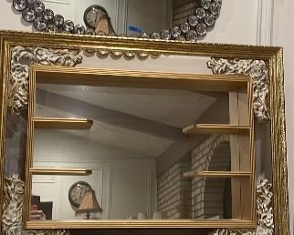Mid-century hanging mirror with shelves approx 30”wx25” tall$225 Oval bejeweled mirror approx26”wide x 26” tall$30