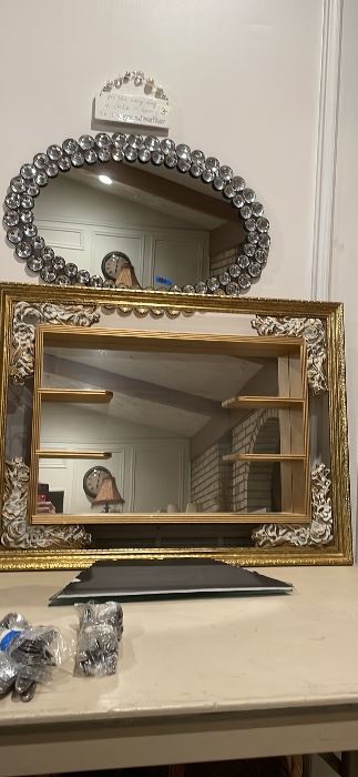 Mid-century hanging mirror with shelves approx 30”wx25” tall$225 Oval bejeweled mirror approx26”wide x 26” tall$30