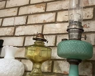 vaseline oil lamp $60 milk glass chimney $30, green opaque glass kerosene lamp with chimney $150