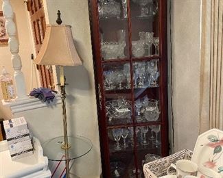 Classic design display cabinetfull of pressed glass imitating American Brilliant. Stems $3 each, serving dishes $20, russian lead glass bowl $45, Irish 8”lead glass pitcher $20. cabinet n contents $500 empty cab $400. 