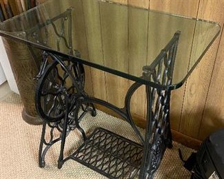 Converted black iron sewing machine table with glass top; 17.75"d x 30"w x 29"h