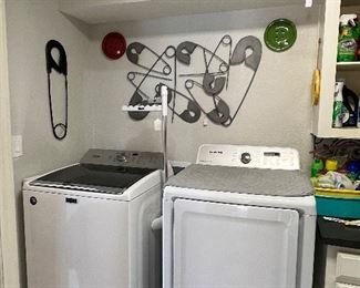 Laundry Room~

Maytag Commercial Technology Washer..
Samsung Moisture Sensing Dryer..
Assorted Everyday Cleaning Chemicals..
Assorted Laundry Room Decor..