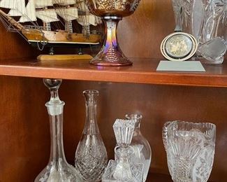 Decanters, model ship (great sail ship), vases, candy bowl