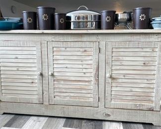 Kitchen sideboard/cabinet, vintage Tupperware, traditional stone rice cooker, turkey roasting pan