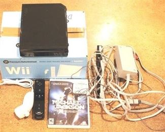 148 - Nintendo Wii with 2 game controllers & cables
