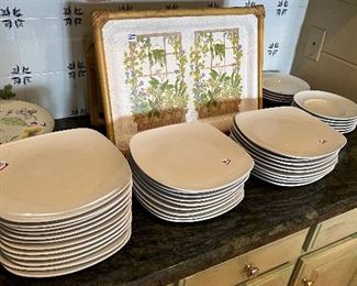 Sets of white plates and bowls