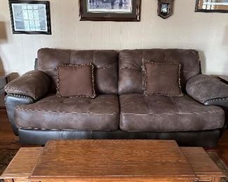 Leather sofa and oak coffee table with two pull out tables