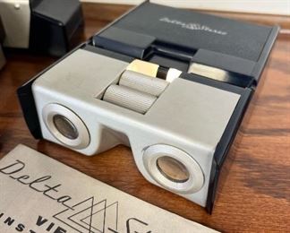 Vintage Delta Stereo camera, flash attachment, viewer and leather case in working condition