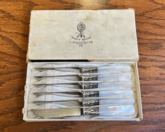 Antique sterling with mother of pearl knife set
