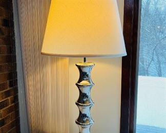 This incredible vintage chrome lamp is 40” tall