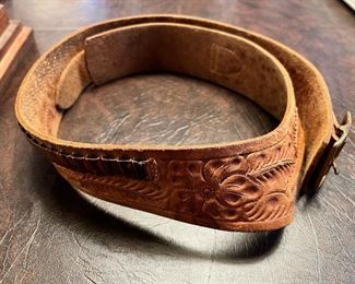 Vintage hand tooled leather belt with ammunition slots