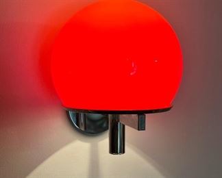 1960’s Lightolier red glass globe and chrome wall sconce. 