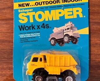 Vintage Schaper Stomper 4x4 yellow dump truck carded