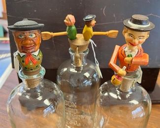 Anri carved wood mechanical bottle toppers