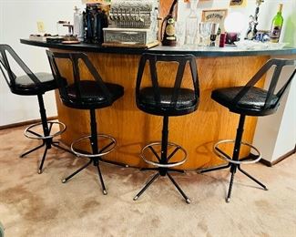 Set of four 1970’s Futura Industries lucite backed bar stools in excellent vintage condition!