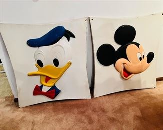 Authentic vintage Walt Disney Productions dimensional signs, assumed to have been mounted to a carnival ride.  Each one is 32”W x 35”T and will be sold as a set