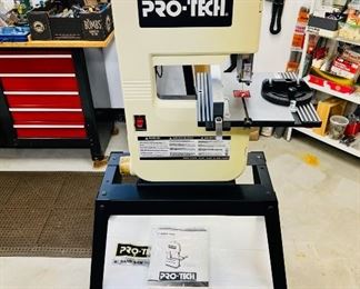 Like New vintage Pro-Tech 9” band saw on power tool stand