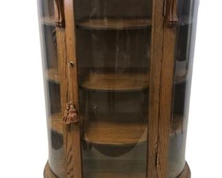 
Oak Curved Glass Clawfoot Display Cabinet With Carved Lion Accents