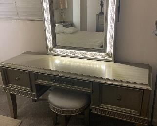 Make up table lights up 51 x 21 1/2 x 68. The mirror is 43 1/2 x 32 1/2.
