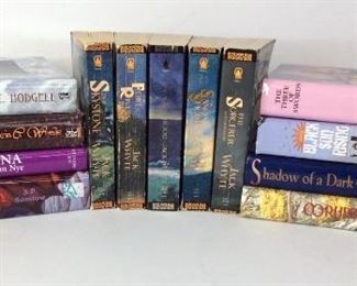 Thirteen (13) paperback Fantasy Novels including: (5) Paperback Novels by Jack Whyte's "The Saxon Shore", "The Skystone", "The Fort at River's Bend" and more; (8) Hardcover books including Raymond E. Feist's "Shadow of a Dark Queen", Patricia C. Wrede's "Magic and Malice" and more. Used but in overall good condition.