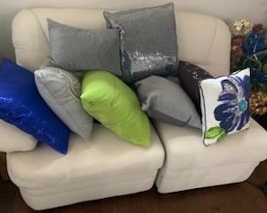 Matching sofabed and ottoman.