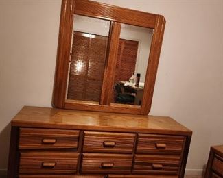 Large 8-drawer dresser with mirror.  Two matching end tables are also available.
