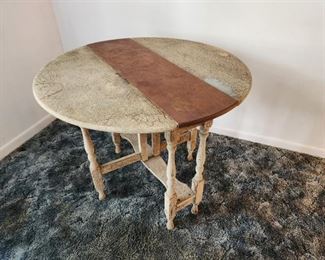 Gate leg table shown with leaves extended.