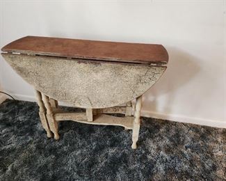 19th century wood round, gate leg drop leaf dining table.
