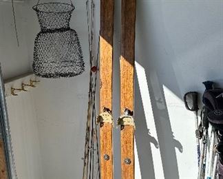Antique Wood Skiis  ,
Fishing Poles 
