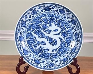 Blue & White Dragon Dish |                                                               Chinese blue and white porcelain dish with central dragon motif and dragon around the outer rim, no apparent markings
Dimensions: h. 2.5 x dia. 11 in
