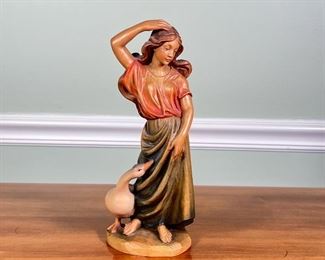 Wooden Carved Figure | Polychrome figure of a girl and a goose
Dimensions: l. 5.5 x h. 10 in