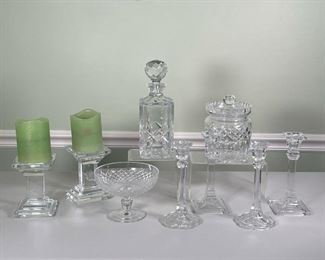 (9pc) Misc Cut Glass | Including an Atlantis decanter with stopper (height 10 in), a pair Ebeling & Reuss candlesticks (8 in.), 2002 pro-am votive holders, a pair square glass candlesticks, a Candy dish and a cookie jar