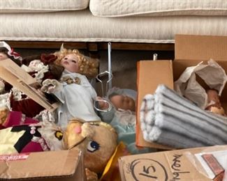 Misc. Dolls and carriage.