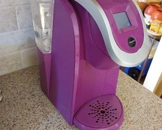 Like new PURPLE  KEURIG  COFFEE MAKER, TEA MAKER, SOUP MAKER, with the original box! WAS $275. Like New,  asking ONLY  $85. obo, low fluid miles,...