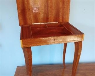 $60. Inlaid Italian diminutive table with built-in Swiss Music Box 
