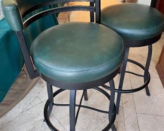 Counter stools. Dark green vinyl on wrought iron stand. Very sturdy
