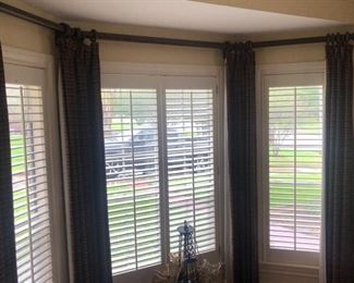 More plantation shutters and some beautiful drapes and rods