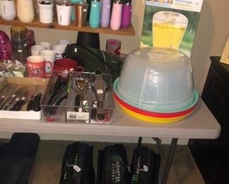 Long table full of various drinkware