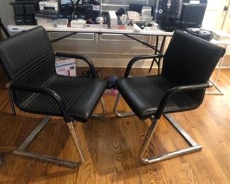 Pair of chrome base arm chairs