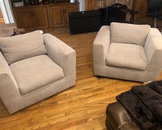 A pair of matching Bernhardt swivel club chairs