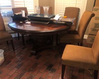 Round pedestal dining table w/ parsons chairs